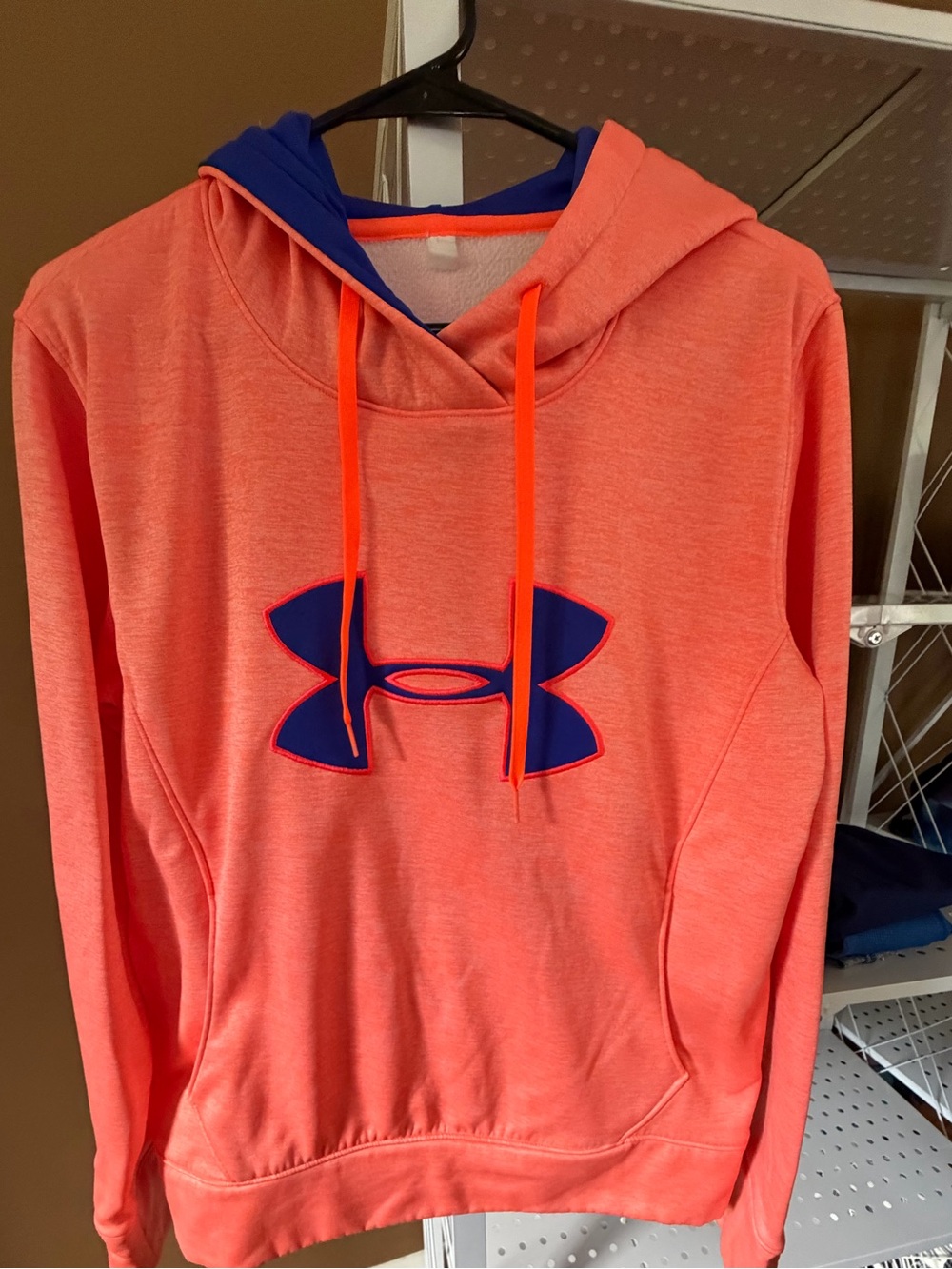Under Armour Women's Coral-Orange Hooded Sweatshirt with Blue Logo